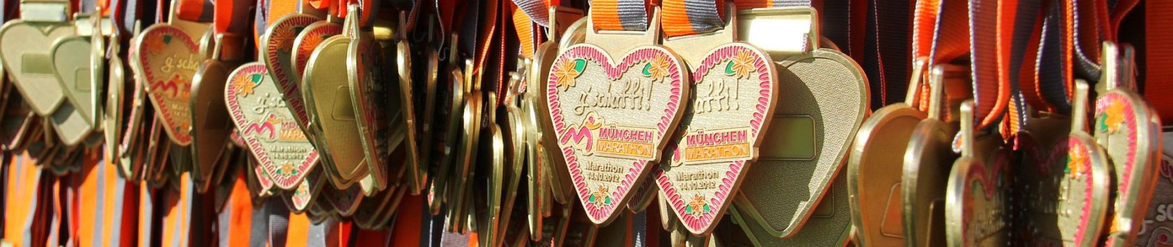 Marathon Training mit RUNNING Company in München bringt dir deine Finisher-Medaille